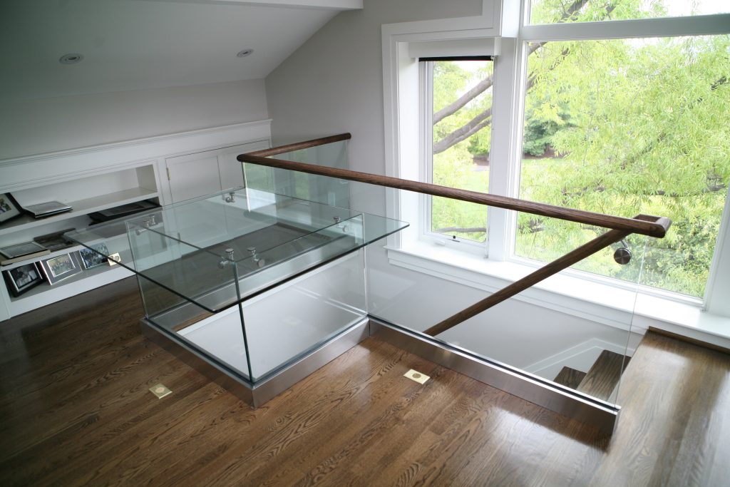 Example of Wood and glass Channel Railing