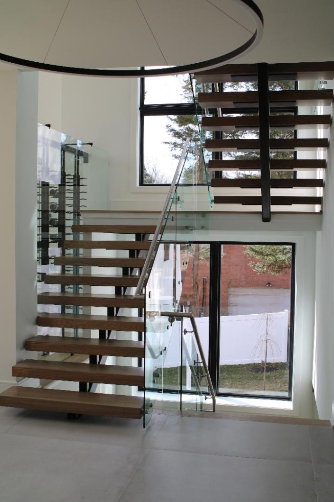 Example of Mono Stringer Stairs with Frameless Glass Railing
