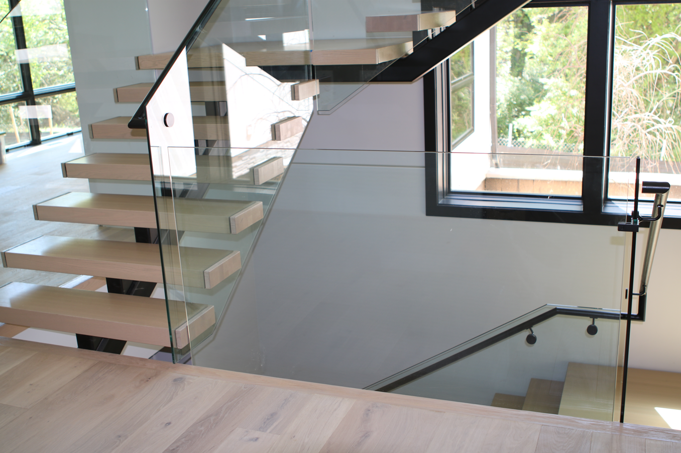 Mono Stringers vs. Open Risers vs. Floating Stairs - AR2 Design Studios